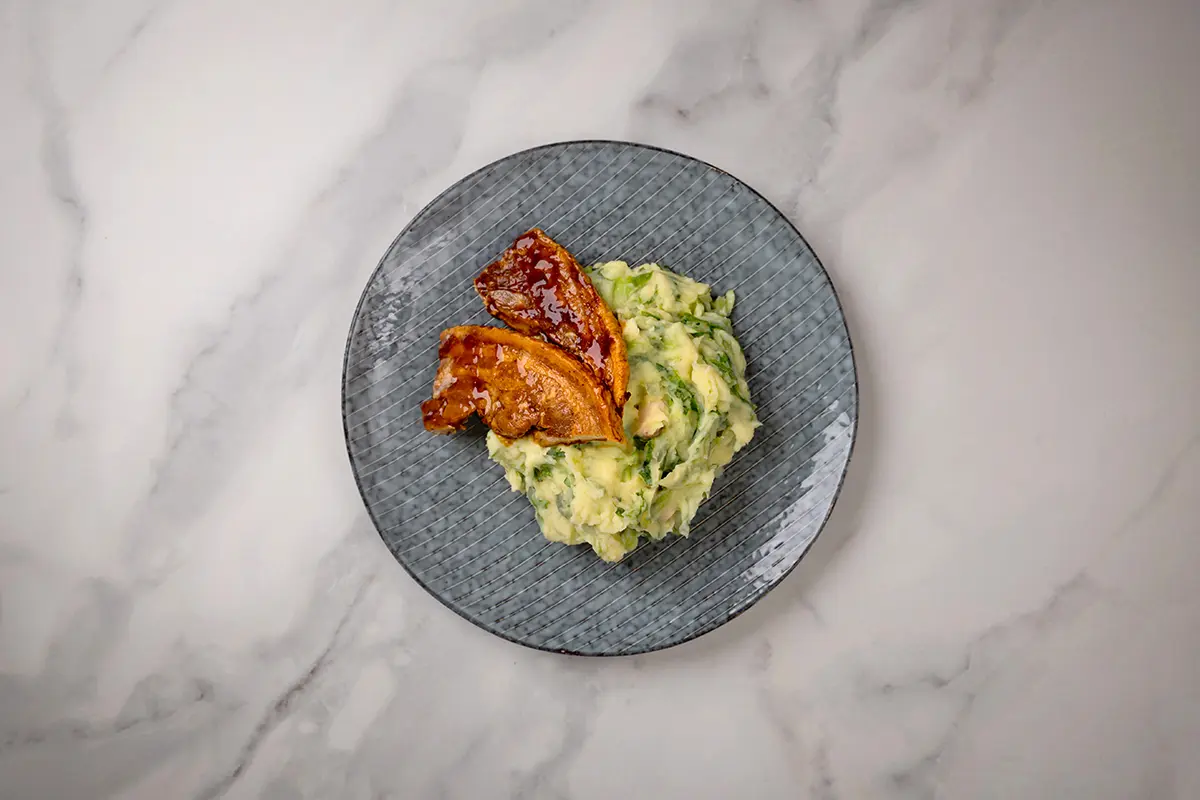 Stamppot andijvie met speklap